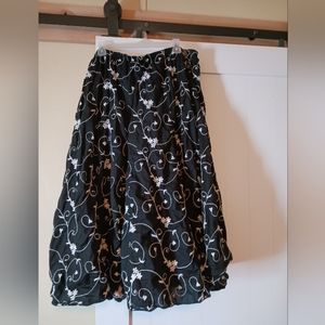 Black and white embroidered tea length skirt